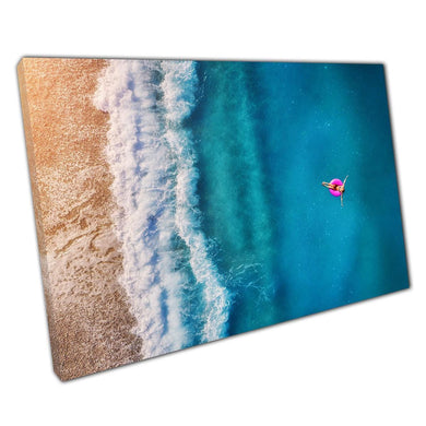 Aerial Beach Paradise: Woman by Clear Blue Ocean Canvas Print - Coastal Wall Art for Home & Office - Print Store
